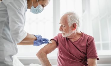Man getting COVID-19 vaccination